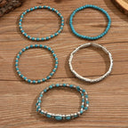 Conjunto de pulseras boho con perlas turquesa